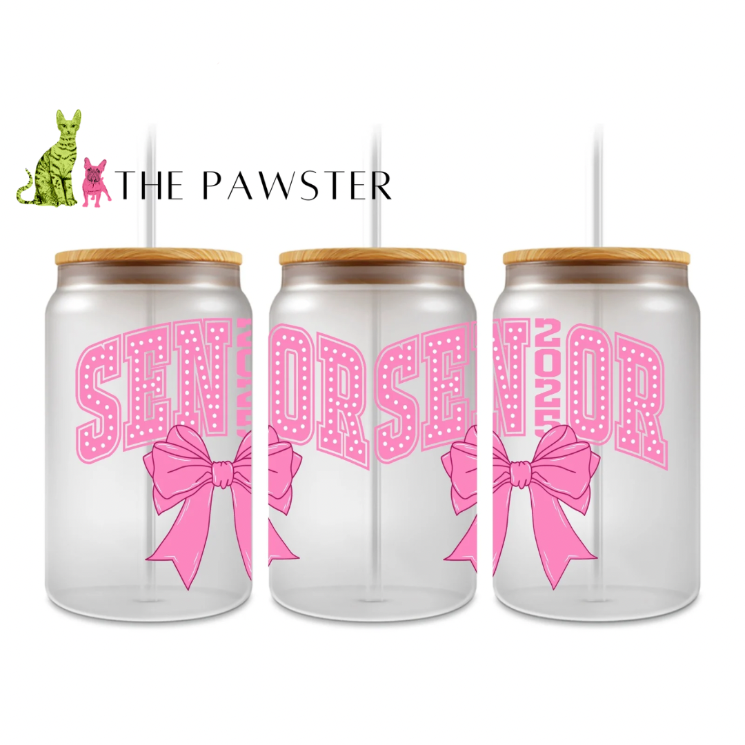Pink UV DTF wrap with large βSenior 2025β varsity text and bow on Libbey glass can, double-sided design