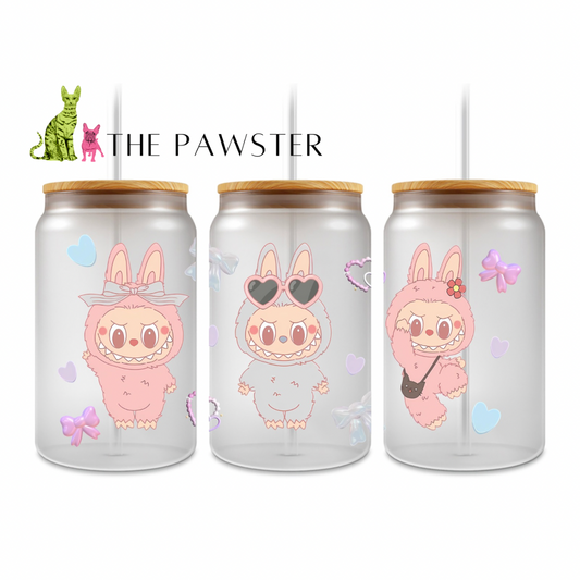 UV DTF cup wrap featuring three pastel monster characters in bunny suits with bows, hearts, and sunglasses