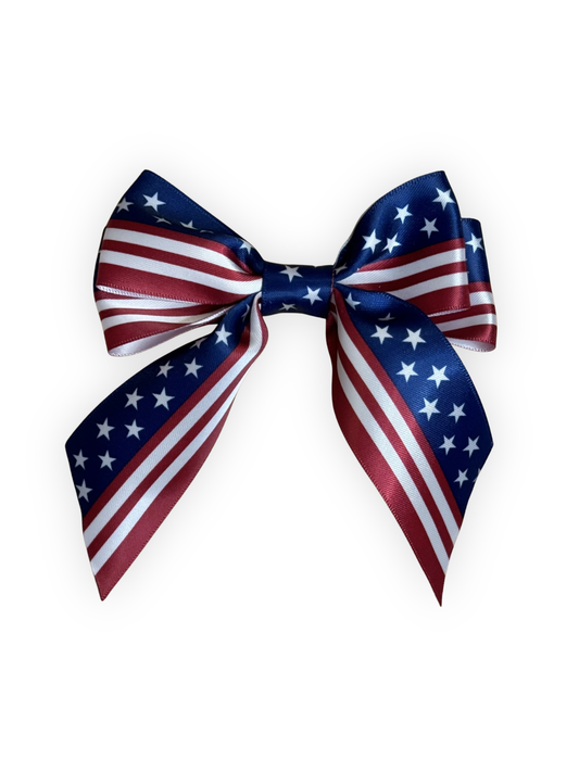 Handmade stars and stripes dog hair bow with alligator clip from The Pawster Rodeo Luxe collection