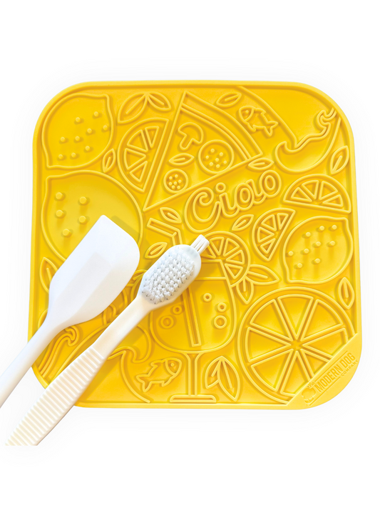 Yellow 8x8 dog lick mat with lemons, pizza, and 'Ciao' design – BPA-free calming slow feeder for dogs