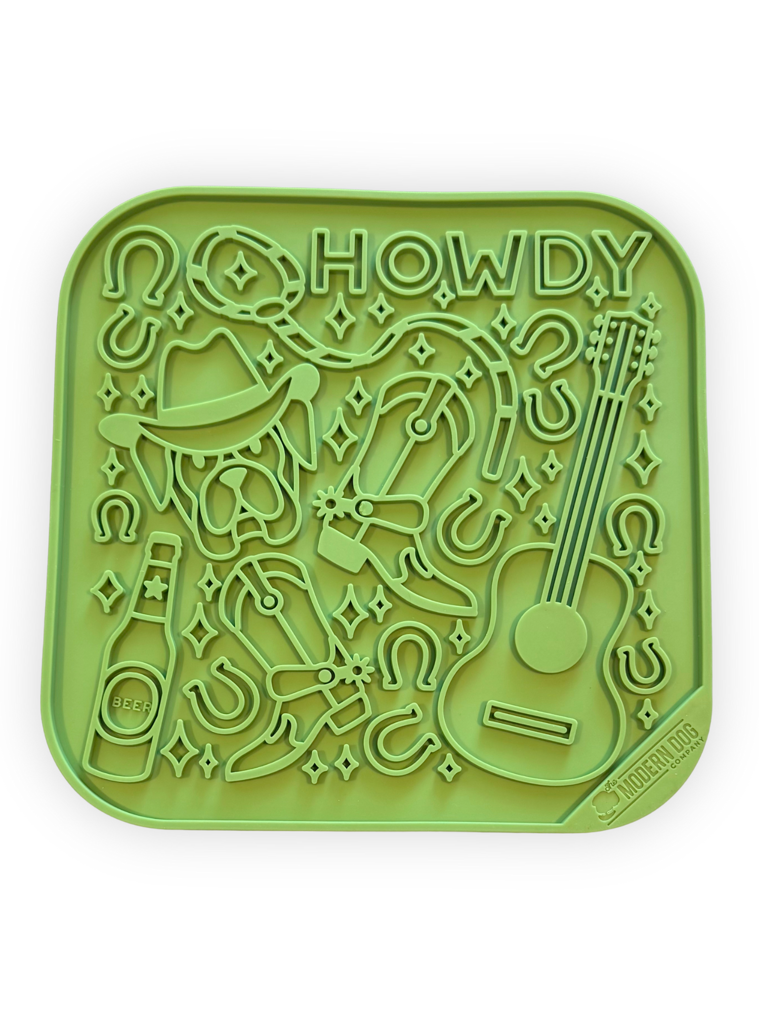 Green western-themed 8x8 dog lick mat with cowboy boots, hat, and guitar – enrichment feeder for dogs