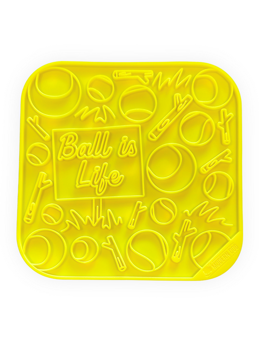 Yellow 8x8 dog lick mat with tennis ball and stick patterns – enrichment mat for ball-obsessed dogs