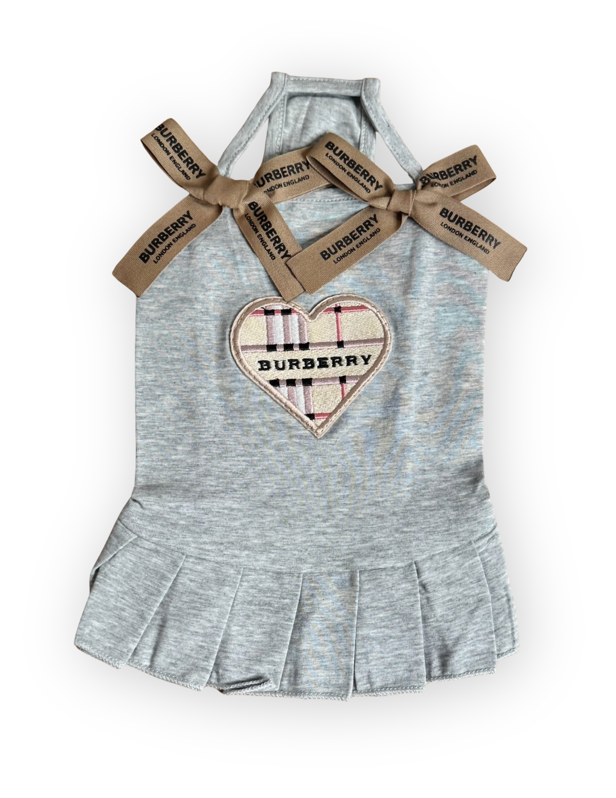 Front view of Preppy Purrberry dog dress with pleated skirt