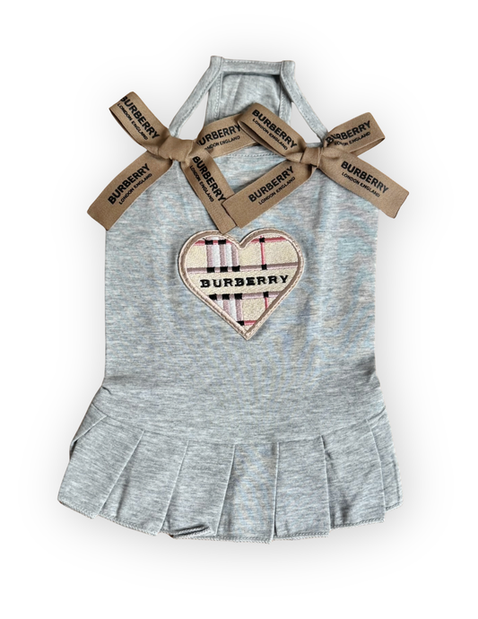 Front view of Preppy Purrberry dog dress with pleated skirt