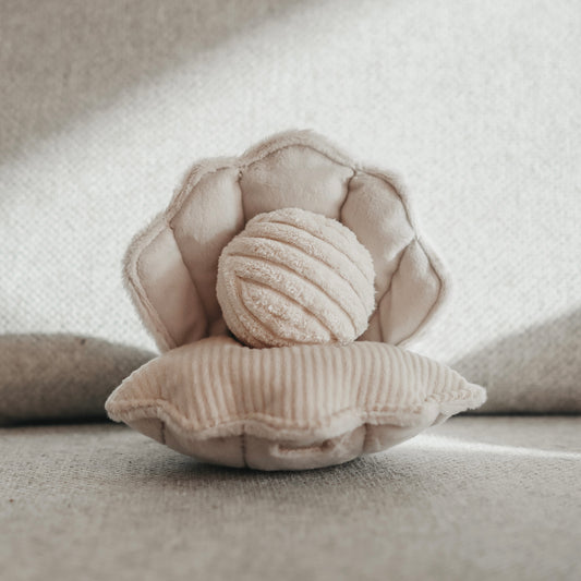 Lambwolf Collective Oyster Pop dog toy with squeaky shell, crinkly texture, and removable squeaky ball treat holder