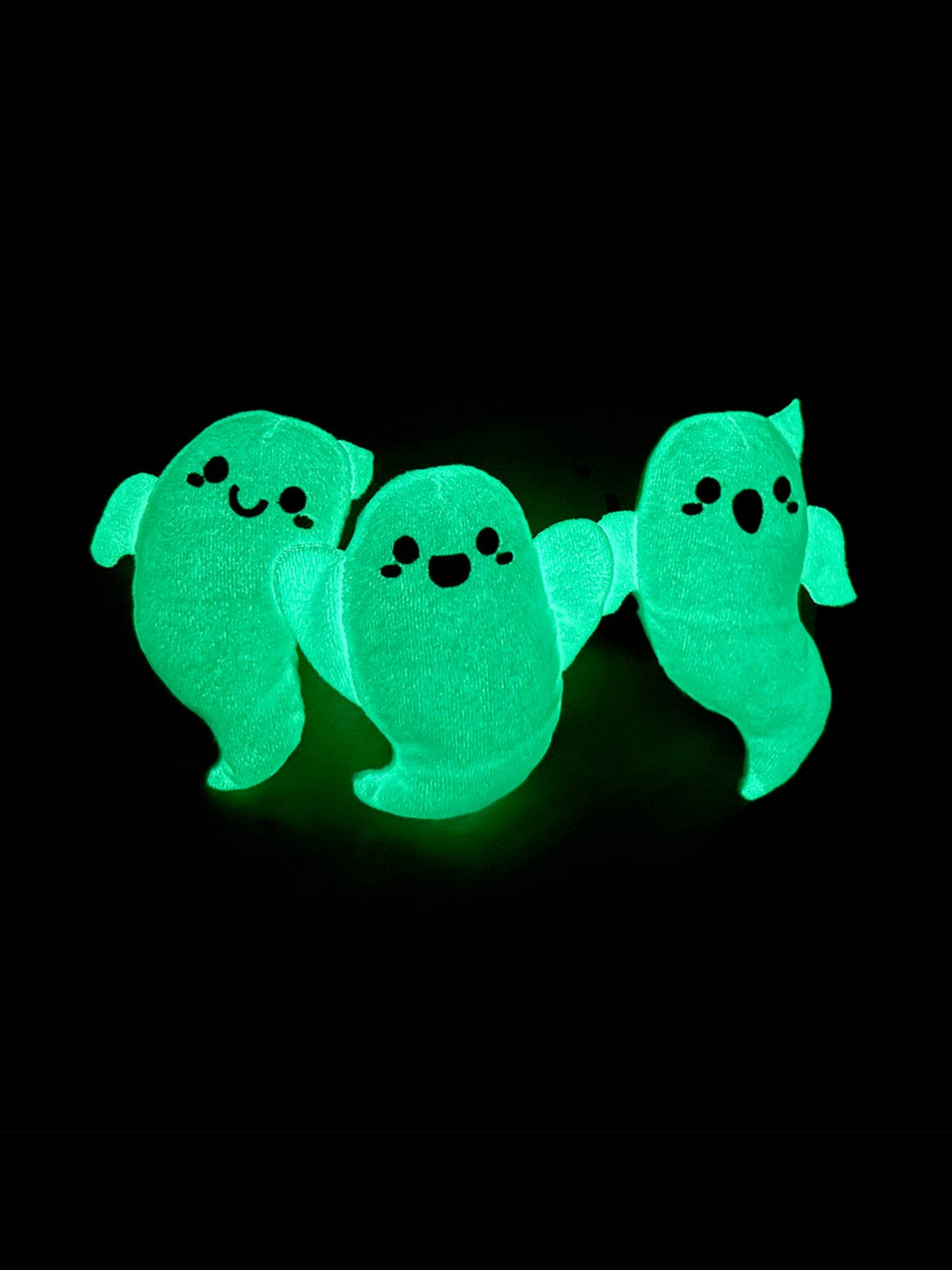 Back view of Glow Ghost Rope Toy with three plush squeaky ghosts on cotton rope