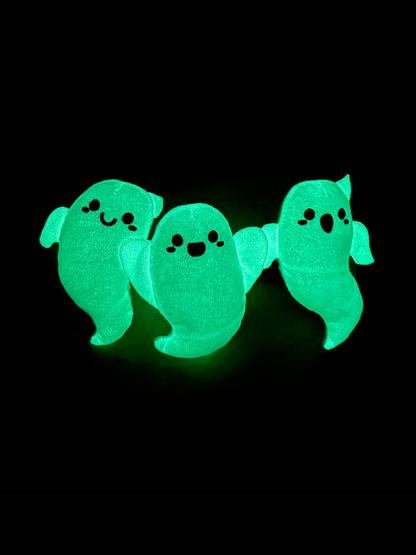 Back view of Glow Ghost Rope Toy with three plush squeaky ghosts on cotton rope